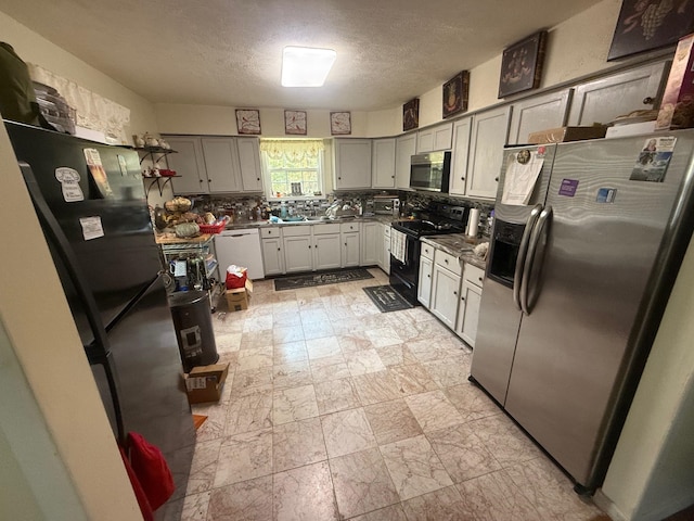 kitchen with decorative backsplash, electric range, stainless steel fridge with ice dispenser, white dishwasher, and refrigerator