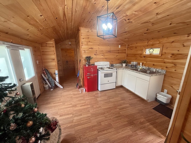 kitchen with light hardwood / wood-style flooring, lofted ceiling, wood walls, and white electric stove