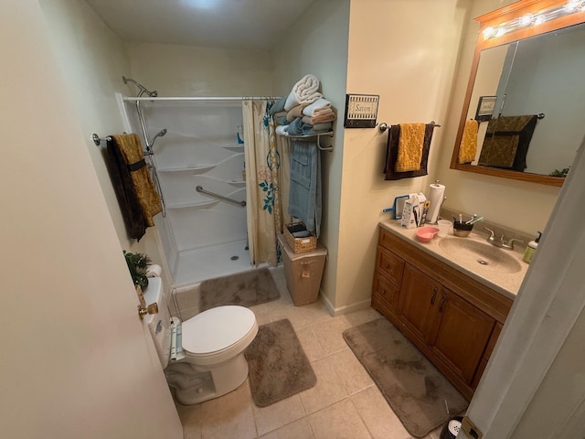 bathroom featuring vanity, a shower with shower curtain, toilet, and tile patterned flooring