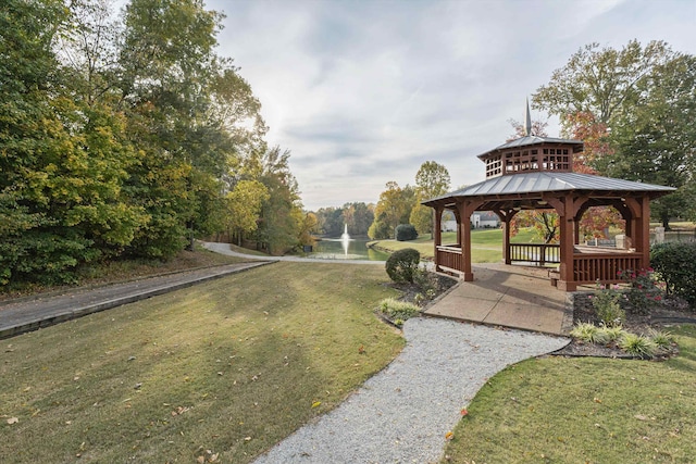 surrounding community with a yard and a gazebo