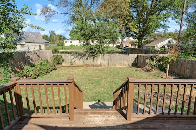 view of yard featuring a wooden deck