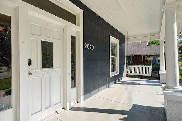 property entrance with a porch