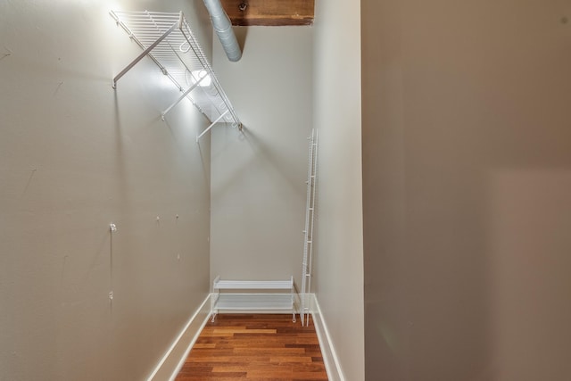 walk in closet featuring hardwood / wood-style floors