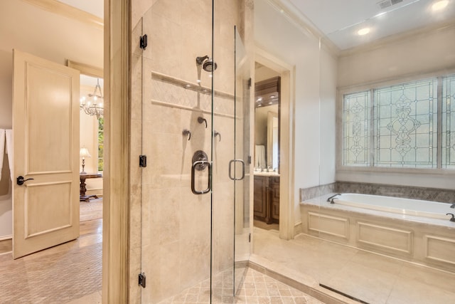 bathroom with tile patterned floors, ornamental molding, a chandelier, and plus walk in shower