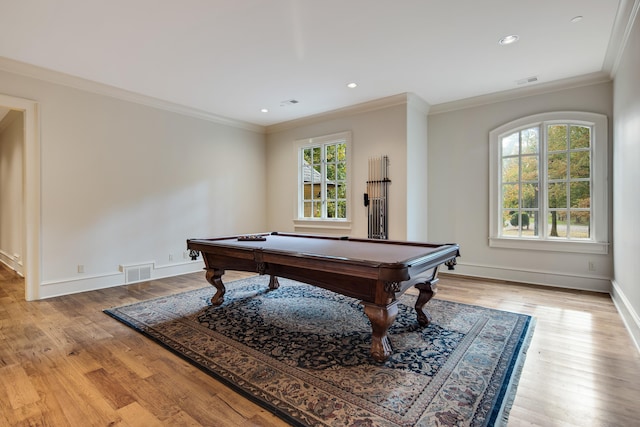 recreation room featuring billiards, light wood-type flooring, and a wealth of natural light