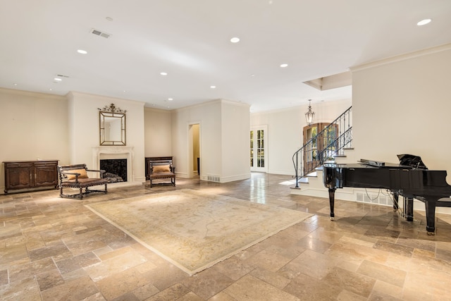 living area featuring ornamental molding