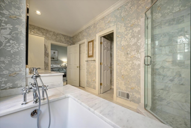 bathroom featuring a shower with door and crown molding