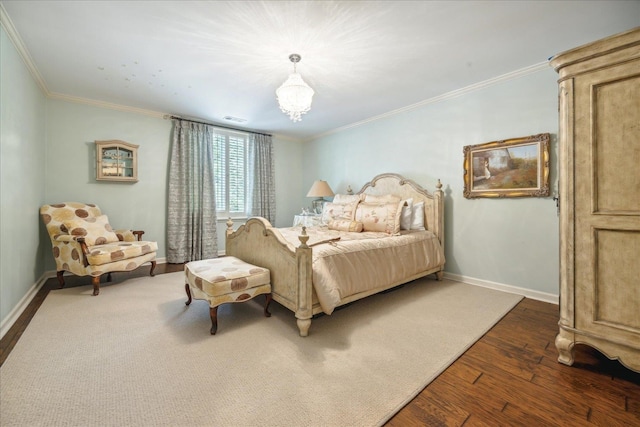 bedroom with ornamental molding and dark hardwood / wood-style floors