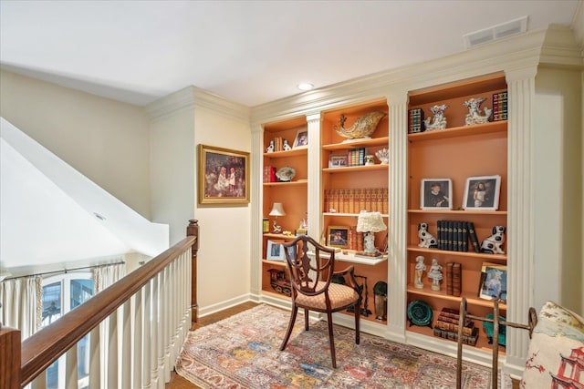 home office featuring crown molding