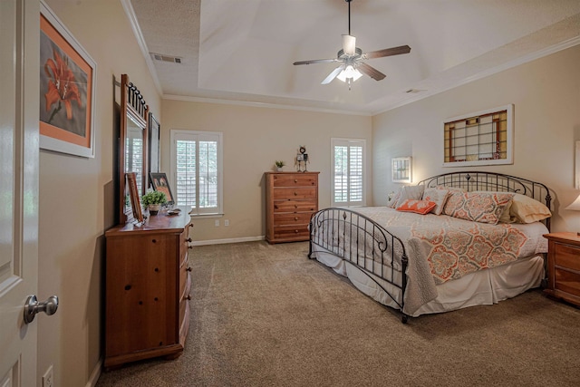 carpeted bedroom with multiple windows, ceiling fan, and crown molding