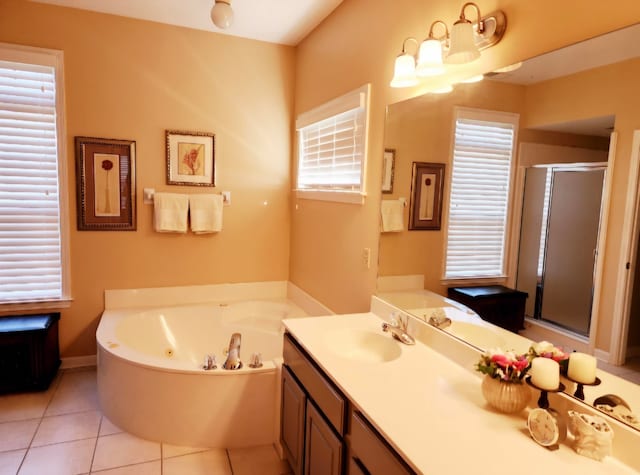 bathroom featuring vanity, shower with separate bathtub, and tile patterned floors