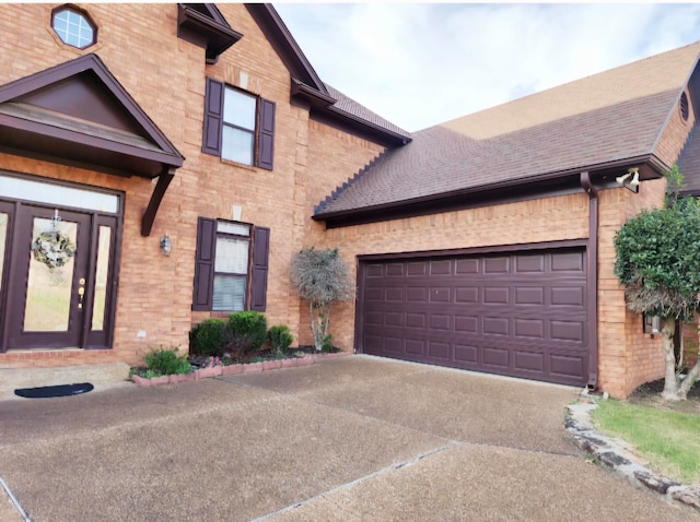 view of front of property with a garage