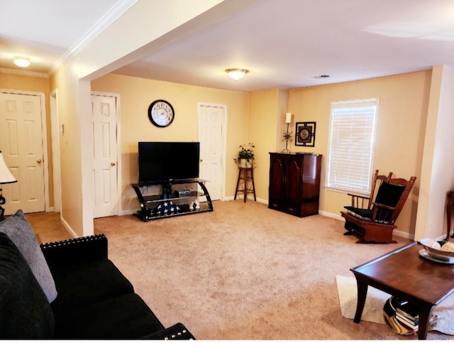 carpeted living room featuring crown molding