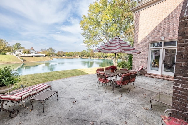 view of patio / terrace with a water view