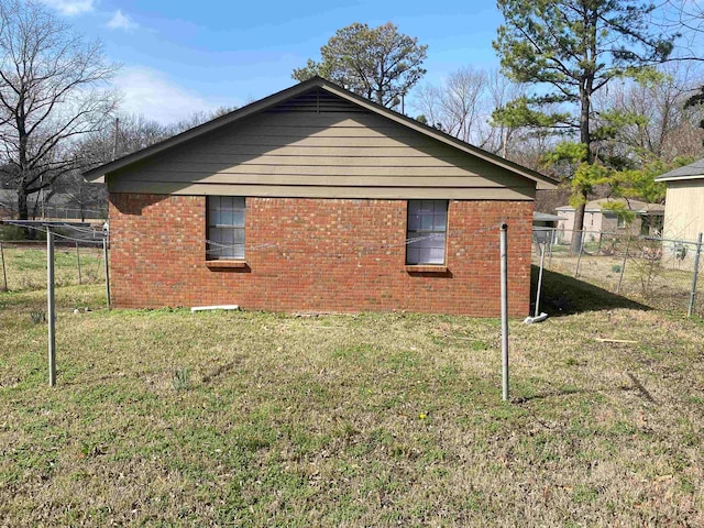 view of home's exterior featuring a lawn