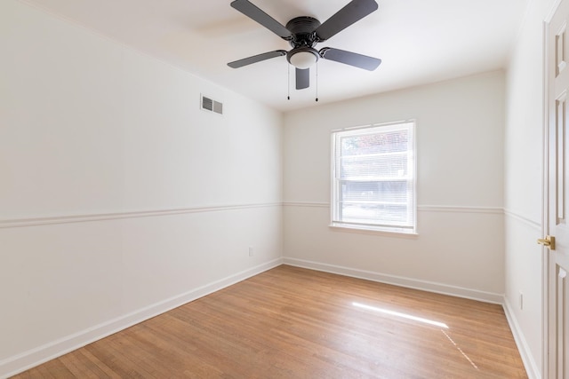 unfurnished room featuring light wood-type flooring and ceiling fan