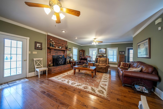 living room featuring hardwood / wood-style floors, plenty of natural light, and ceiling fan