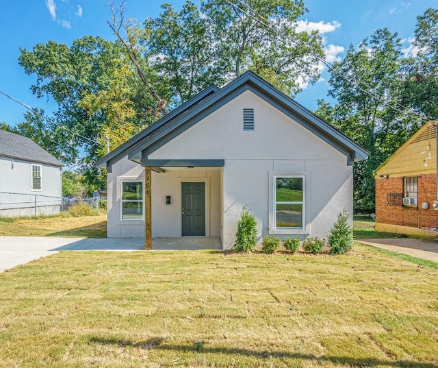 bungalow with a front lawn