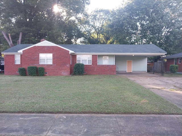 3811 Patte Ann Dr, Memphis, TN 38116 - ranch-style house with concrete driveway, a front yard, a carport, brick siding, and crawl space
