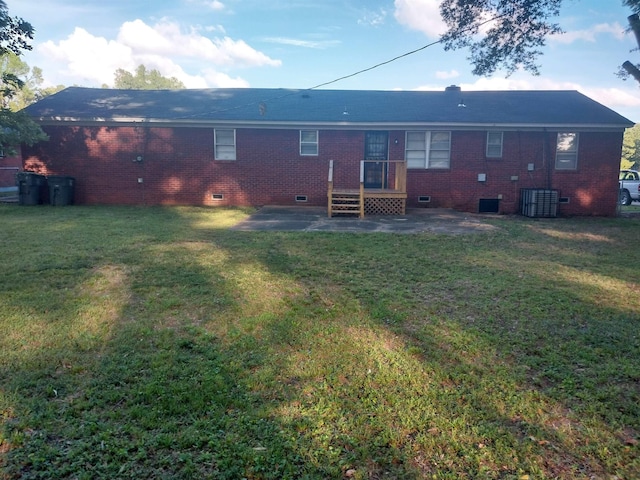 3811 Patte Ann Dr, Memphis, TN 38116 - rear view of house featuring crawl space, a patio, brick siding, and a lawn
