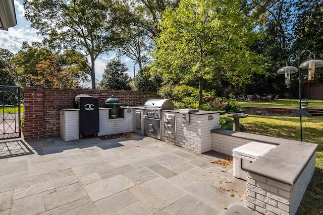 view of patio with grilling area and exterior kitchen