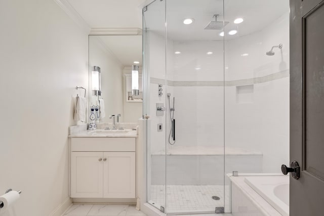 bathroom featuring vanity, crown molding, and independent shower and bath