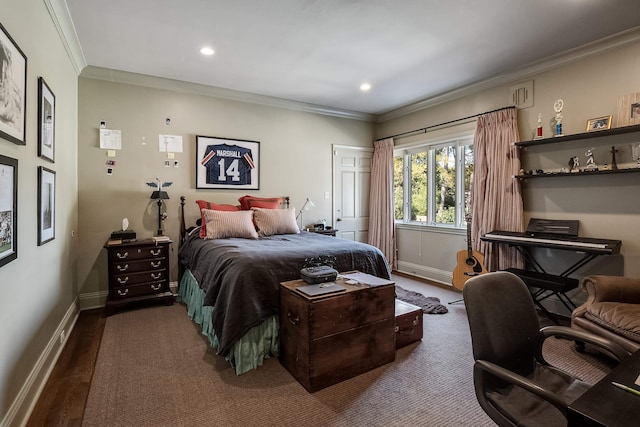 bedroom with crown molding and hardwood / wood-style floors