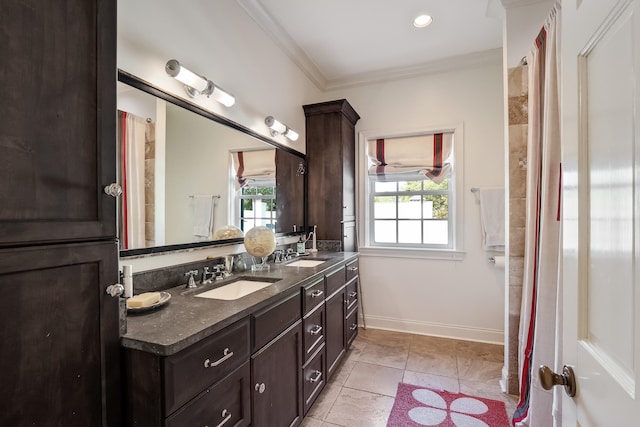 bathroom with vanity, tile patterned floors, and ornamental molding