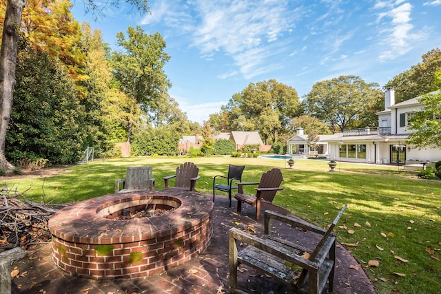 view of patio / terrace featuring a fire pit