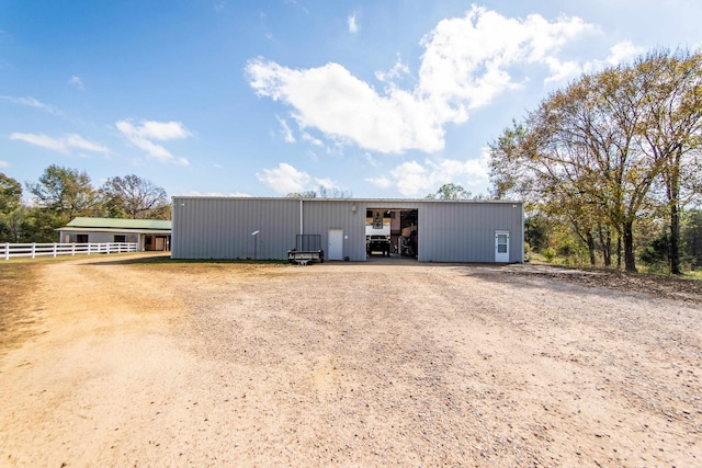 view of front of home with an outdoor structure