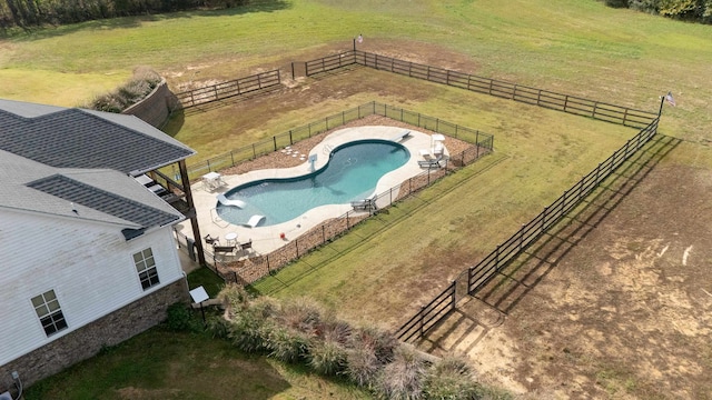 birds eye view of property featuring a rural view