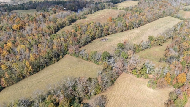 birds eye view of property featuring a rural view