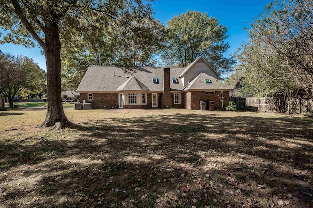 view of front of property with a patio area and a front yard