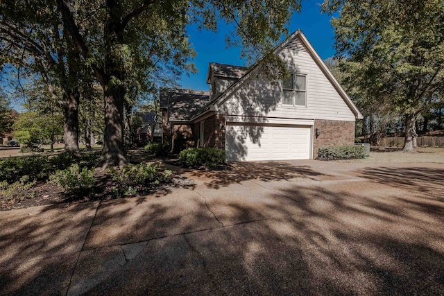 view of home's exterior featuring a garage