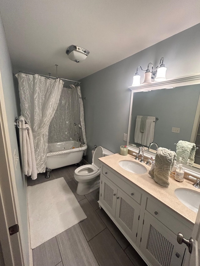 full bathroom with toilet, shower / bathtub combination with curtain, vanity, and wood-type flooring