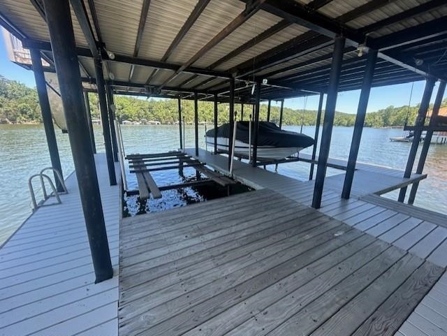 view of dock with a water view