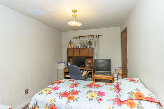 bedroom with a textured ceiling