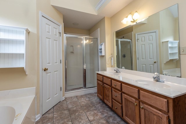 bathroom with vanity, plus walk in shower, and tile patterned flooring