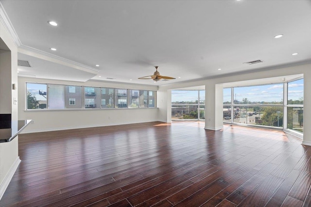 unfurnished living room with crown molding, dark hardwood / wood-style flooring, and ceiling fan