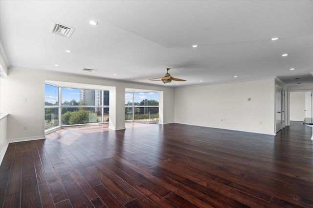 unfurnished living room with crown molding, dark hardwood / wood-style floors, and ceiling fan