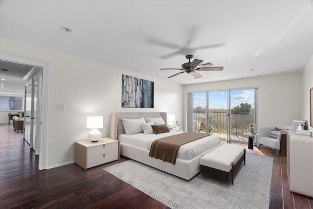 bedroom featuring access to exterior, ceiling fan, and dark hardwood / wood-style flooring