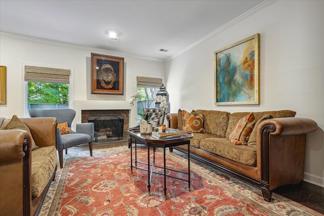 living room featuring ornamental molding and hardwood / wood-style flooring