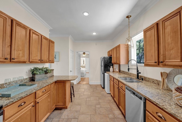 kitchen featuring a sink, light stone countertops, stone tile flooring, and appliances with stainless steel finishes