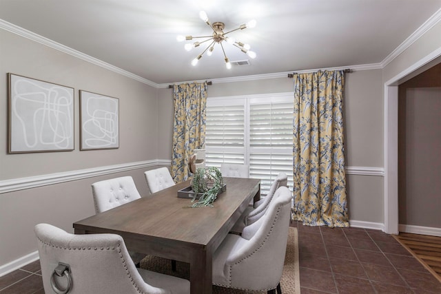 tiled dining space with ornamental molding and an inviting chandelier