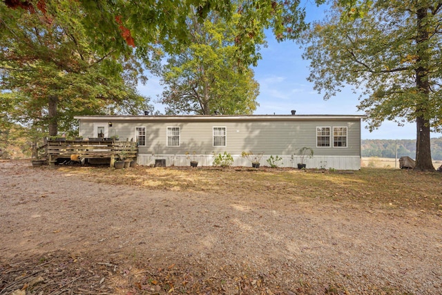 rear view of house with a deck