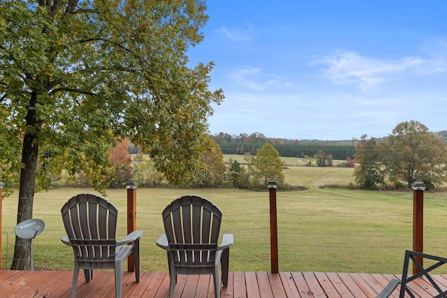 wooden terrace with a yard