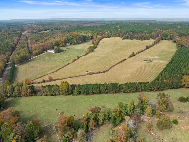 birds eye view of property with a rural view