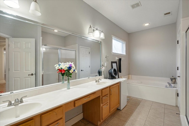 bathroom with vanity, plus walk in shower, and tile patterned flooring