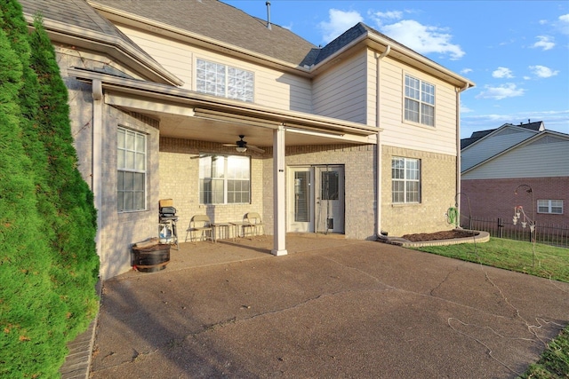 back of house featuring a patio area and ceiling fan