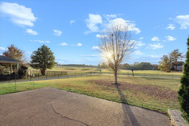 view of yard with a patio area and a rural view